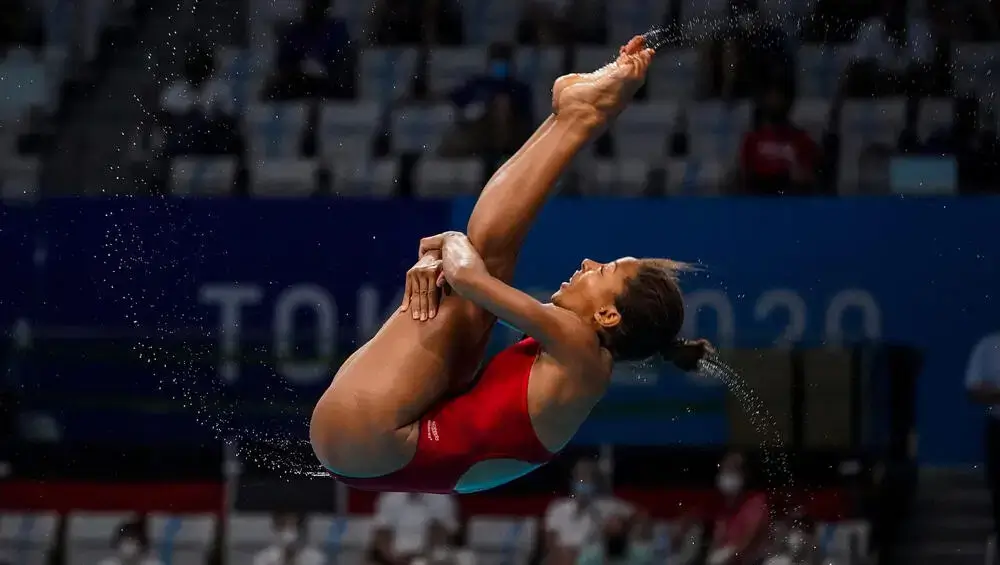 прыжки в воду правила. Олимпийская медалистка Дженнифер Абель.